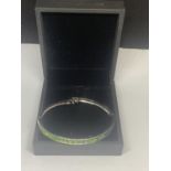 A KATE LYNN SWAROVSKI CRYSTAL BANGLE