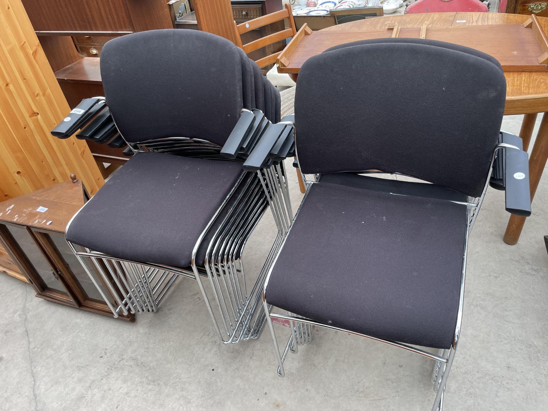 FIFTEEN MODERN STACKING CHAIRS