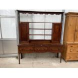 A GEORGE III OAK AND MAHOGANY CROSSBANDED DRESSER WITH SHELL INLAY TO THREE DRAWERS AND PLATE RACK