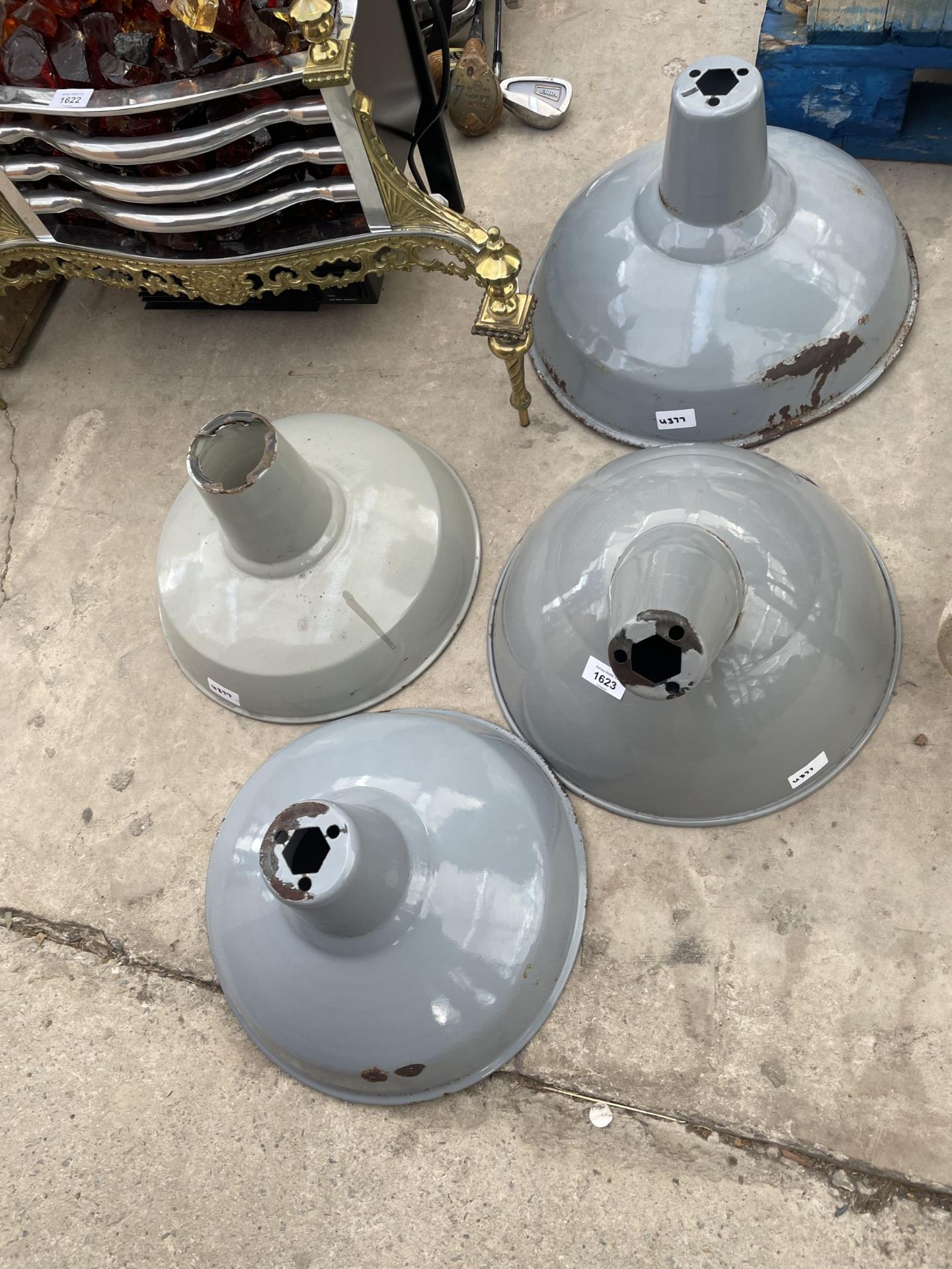 A GROUP OF FOUR GREY INDUSTRIAL STYLE LIGHT SHADES