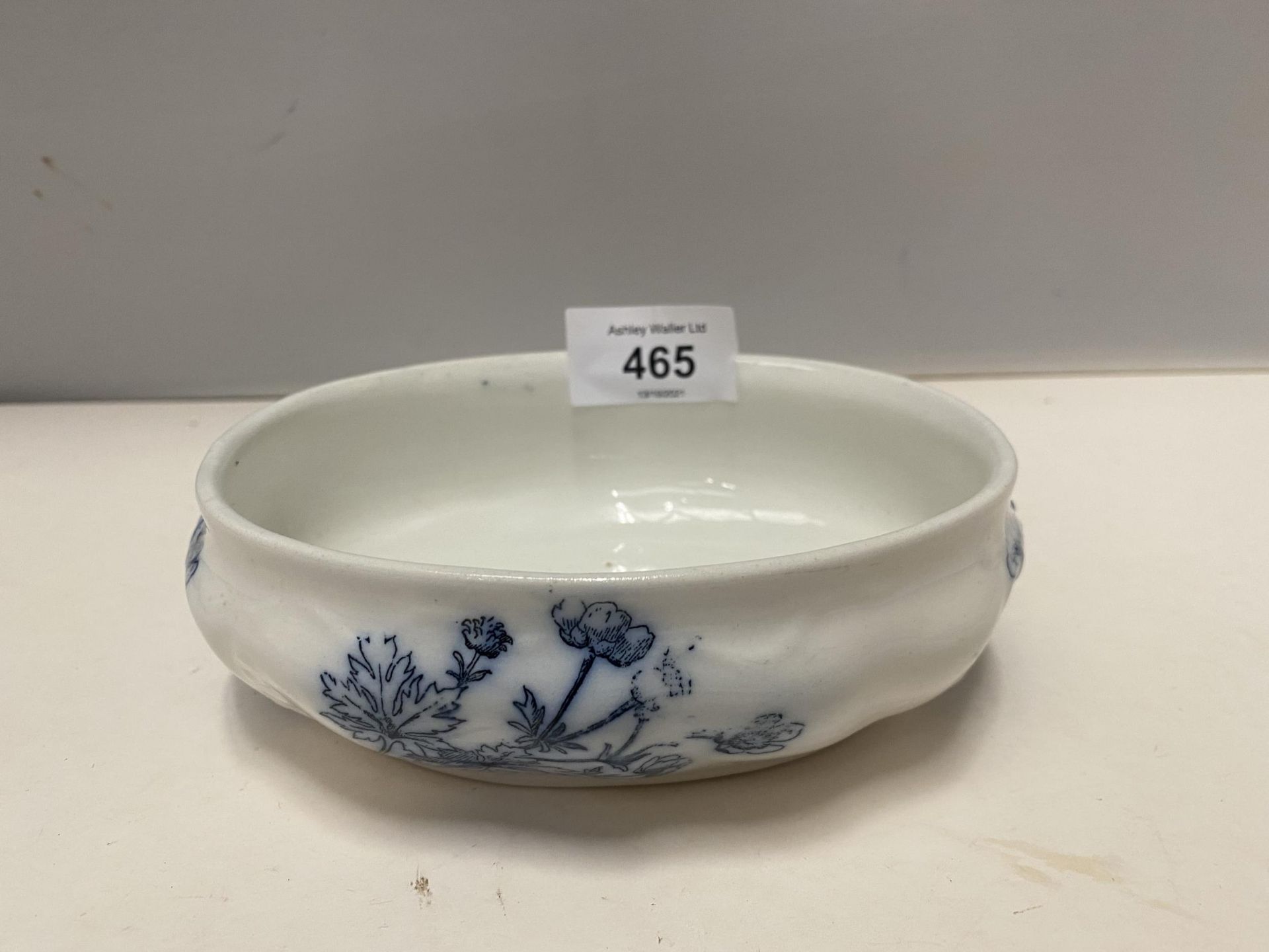 A PRETTY BLUE AND WHITE OVAL SHAPED DISH STAMPED DOULTON BURSLEM