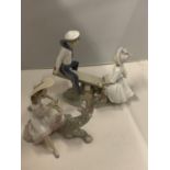 TWO LLADRO FIGURINES, ONE OF A BOY AND GIRL ON A SEE-SAW, THE OTHER OF A GIRL WITH A BASKET OF