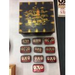 TEN VINTAGE MINATURE OXO TINS AND A LARGER ORIENTAL PATTERNED TIN