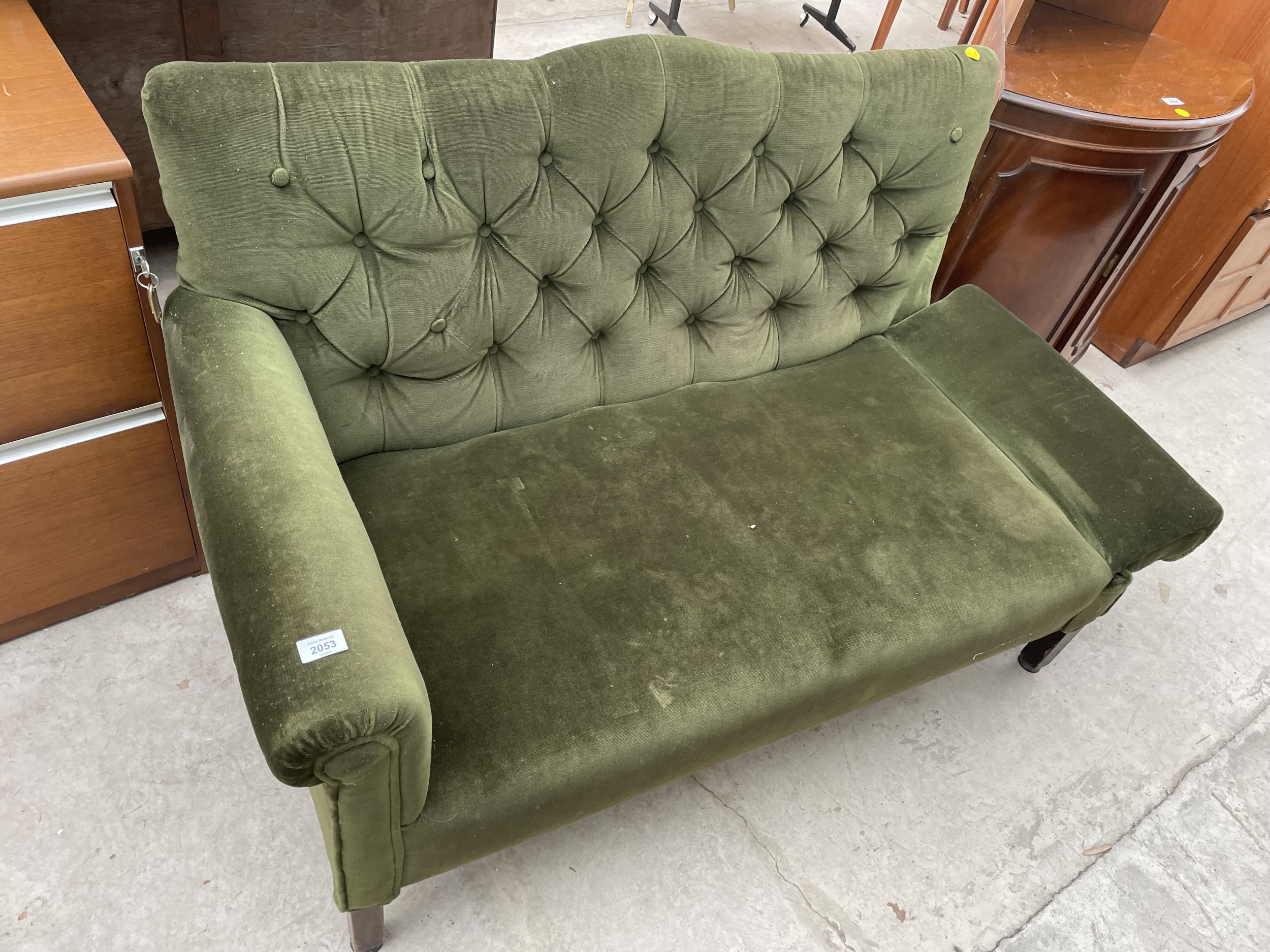 A 20TH CENTURY BUTTON BACK DROP-END SETTEE