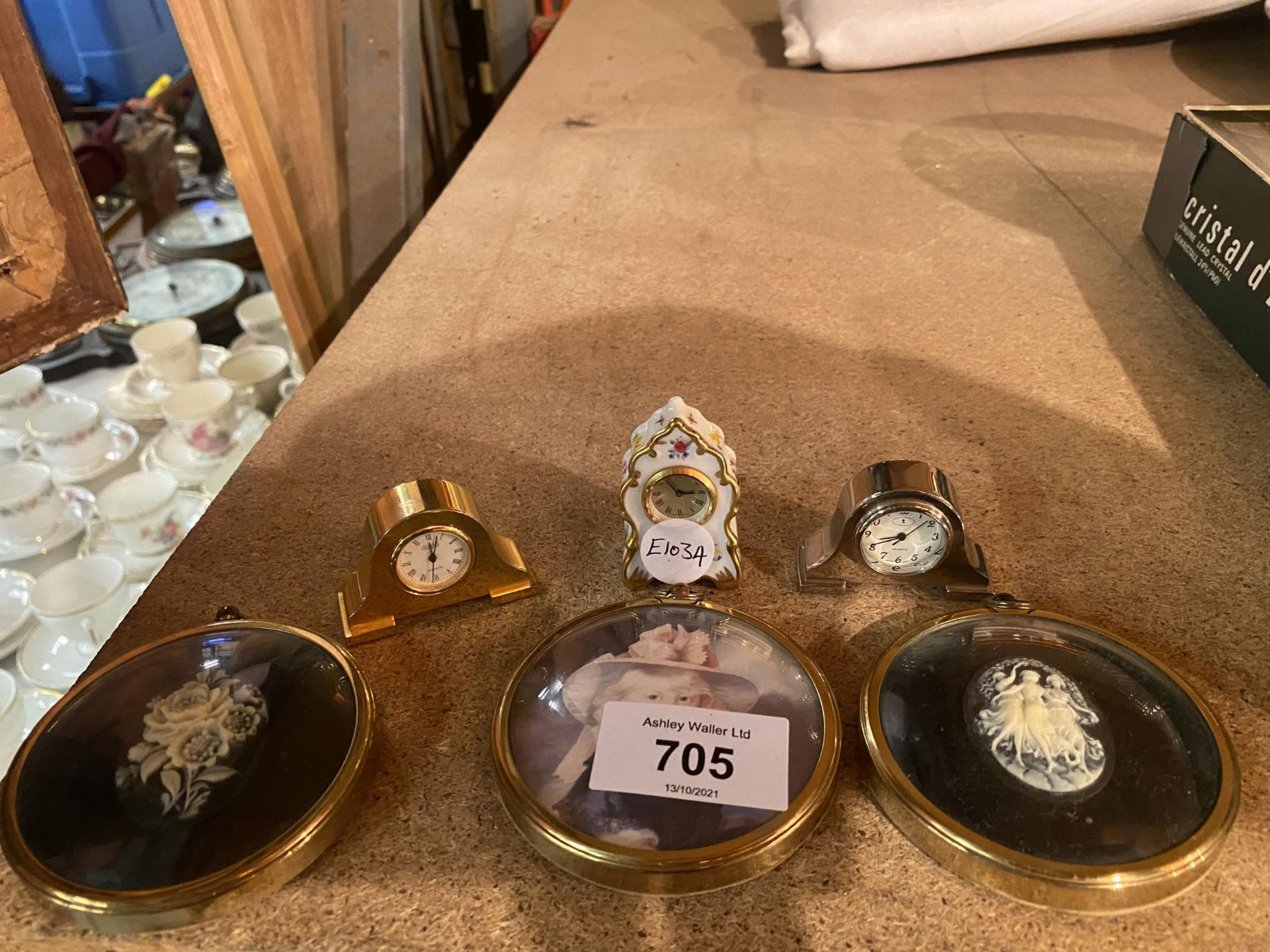 THREE MINIATURE CLOCKS AND THREE SMALL CAMEOS