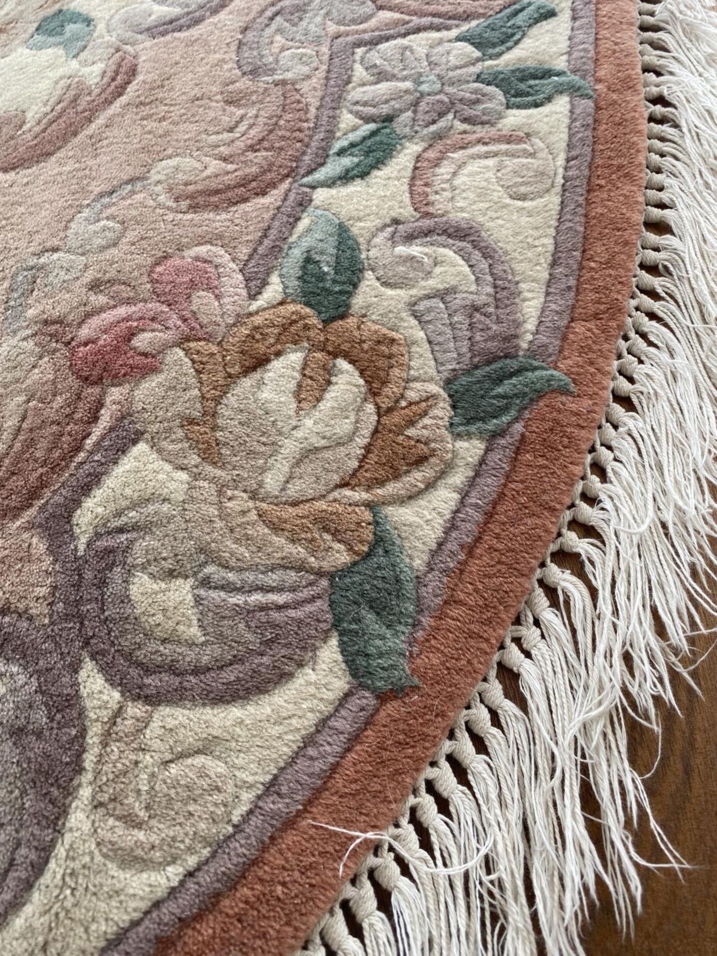 A FLORAL PATTERNED OVAL RUG - Image 2 of 2