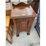 AN ART NOUVEAU WALNUT BEDSIDE LOCKER