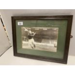 A FRAMED PICTURE OF BERT TRAUTMANN WHO WAS A PRISONER OF WAR. HE PLAYED FOR MANCHESTER CITY AND