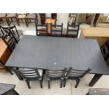 A MODERN KAUSTBY BLACK DINING TABLE, 80 X 42", COMPLETE WITH TWO LEAVES, 18" WIDE AND EIGHT