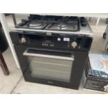 A BLACK SMEG INTERGRATED OVEN AND A HOB