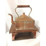 A SQUARE COPPER KETTLE TOGETHER WITH SQUARE STAND OVERALL HEIGHT 45CM, WIDTH 36CM
