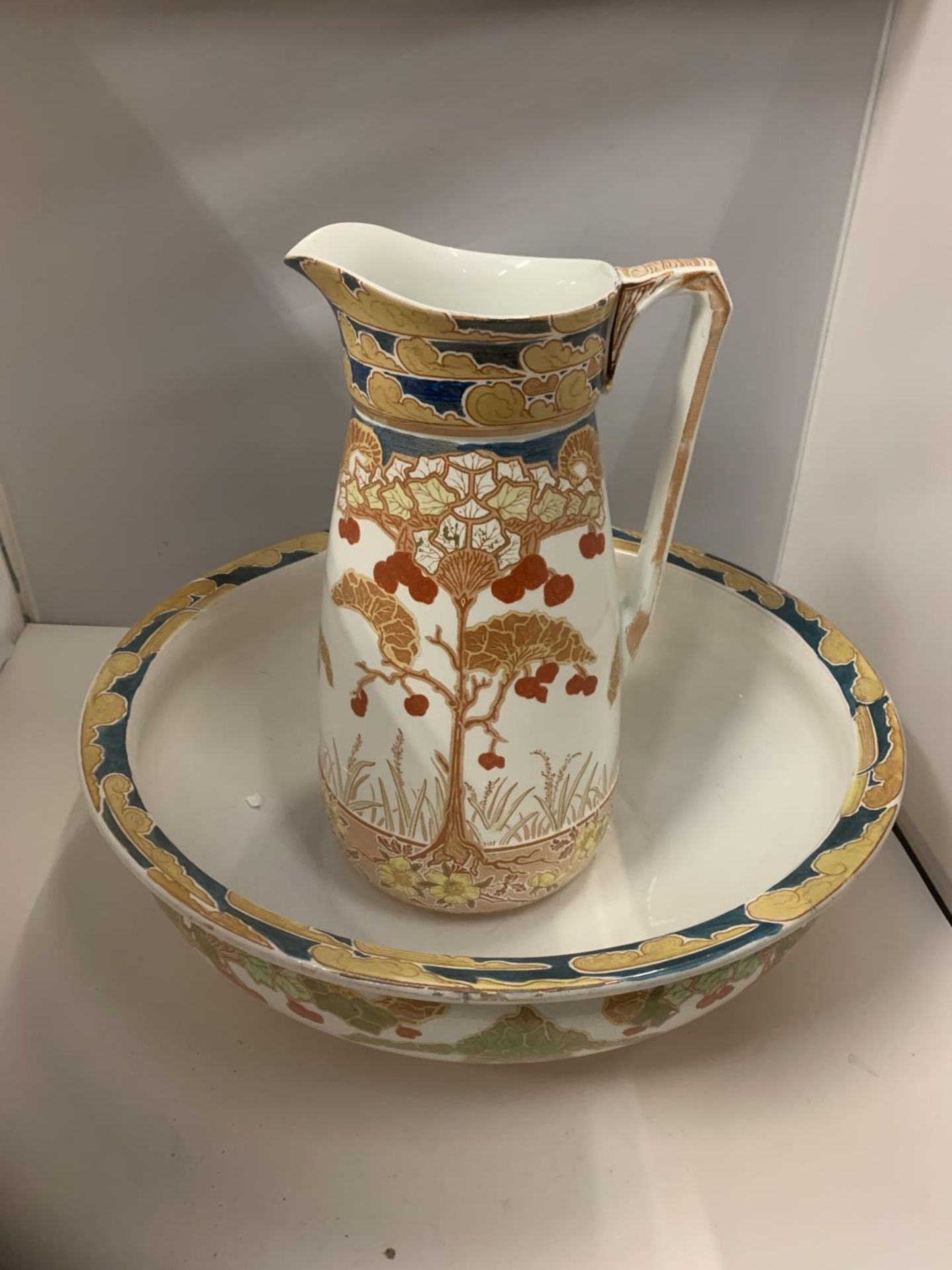 A BOOTHS LARGE WASHBOWL AND WATER JUG IN THE CURZON PATTERN DIAMETER OF BOWL 42CM, HEIGHT OF THE JUG