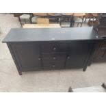 A MODERN BLACK SIDEBOARD ENCLOSING THREE DRAWERS AND TWO CUPBOARDS, 61.5" WIDE