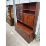 A MODERN MAHOGANY AND CROSSBANDED LOUNGE UNIT, 52.5" WIDE