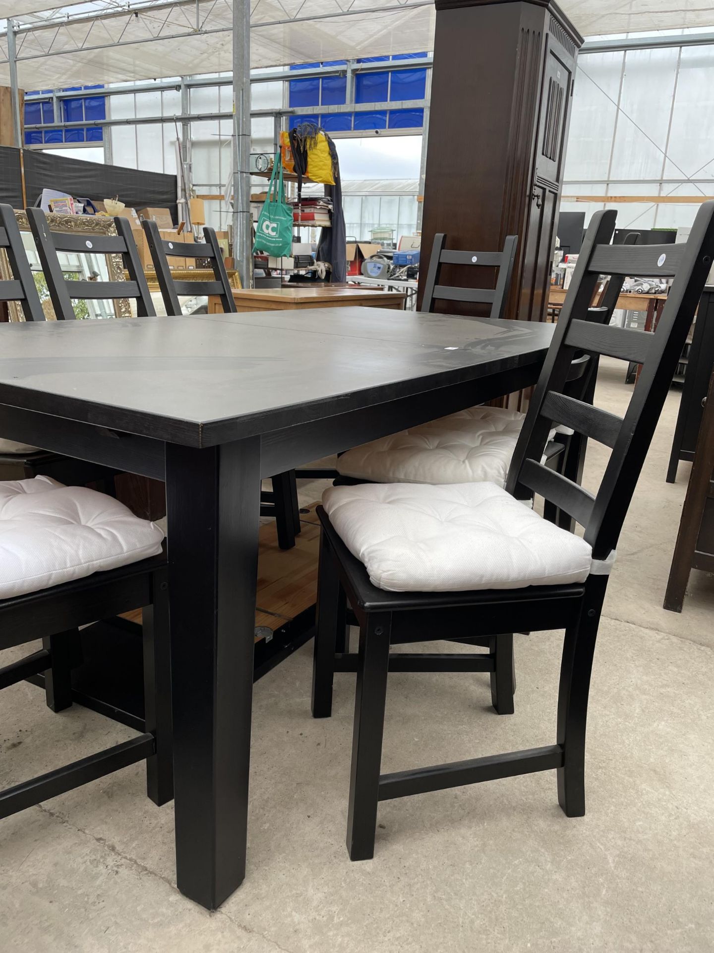 A MODERN KAUSTBY BLACK DINING TABLE, 80 X 42", COMPLETE WITH TWO LEAVES, 18" WIDE AND EIGHT - Image 2 of 3