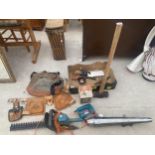 AN ASSORTMENT OF ITEMS TO INCLUDE A SLEDGE HAMMER, AN ELECTRIC HEDGE TRIMMER AND A TOOL BELT ETC
