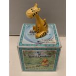 A BESWICK TIGGER WITH A ROYAL DOULTON PRESENTATION BOX