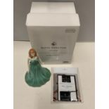 A BOXED ROYAL DOULTON GEMSTONES FIGURINE WITH A GENUINE SWAROVSKI CRYSTAL - MAY - EMERALD