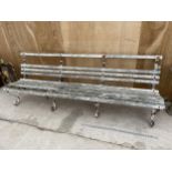 A LARGE VINTAGE WROUGHT IRON AND SLATTED WOODEN GARDEN BENCH