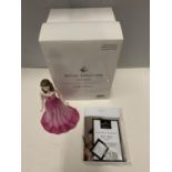 A BOXED ROYAL DOULTON GEMSTONES FIGURINE WITH A GENUINE SWAROVSKI CRYSTAL - JULY - RUBY