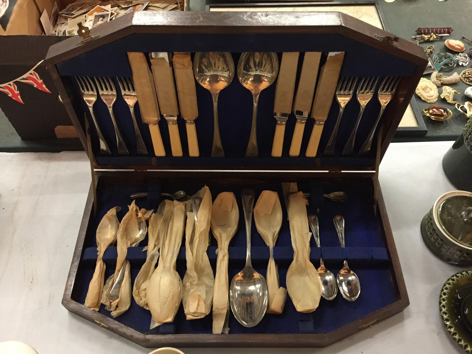 NICKLE PLATED FLATWARE IN A MAHOGANY BOX