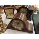 THREE VINTAGE WOODEN CLOCKS, A FERRANTI ELECTRICAL ONE, A NAPOLEONS HAT AND ONE WHICH BEARS A PLAQUE