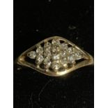 A 9 CARAT GOLD RING WITH SMALL CLEAR STONES IN A DIAMOND DESIGN SIZE N GROSS WEIGHT 2.3 GRAMS