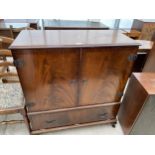 A MODERN ANTIQUE STYLE TV CABINET