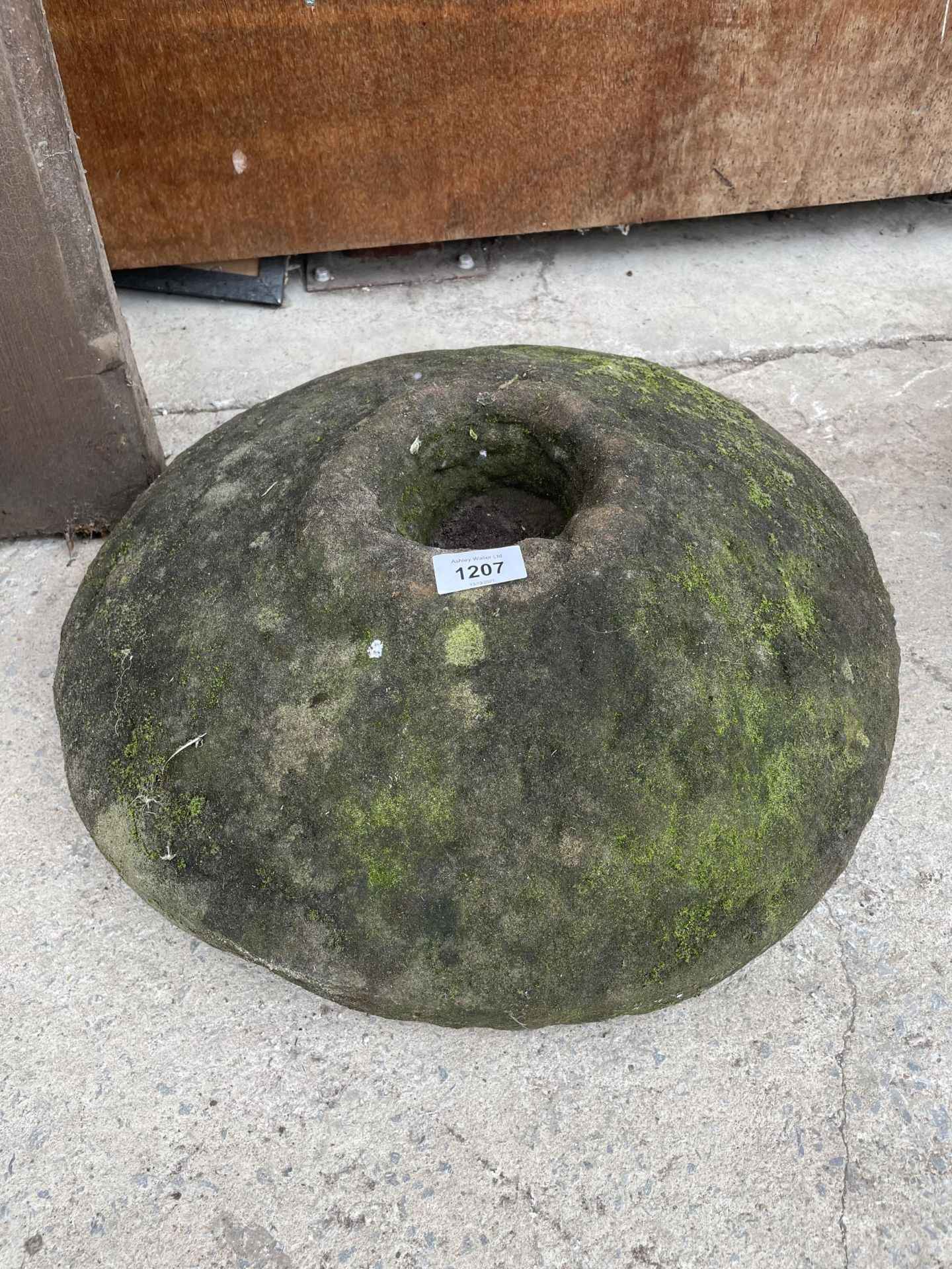 A STONE BASE/STADDLE STONE TOP