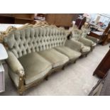 AN ITALIAN STYLE GILT THREE PIECE BUTTON BACK LOUNGE SUITE COMPRISING THREE SEATER SETTEE AND TWO