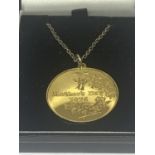 A SILVER GILT MOTHERS DAY 1975 PENDANT ON A CHAIN WITH A PRESENTATION BOX