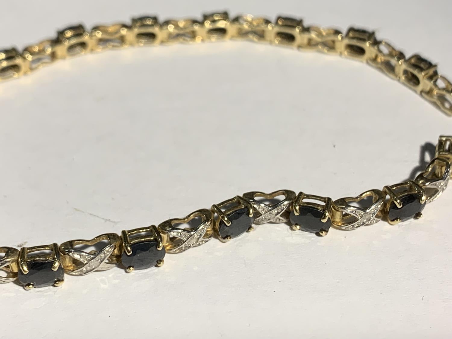 A 9 CARAT GOLD BRACELET WITH SAPPHIRES AND DIAMONDS (A/F) GROSS WEIGHT 7.6 GRAMS - Image 2 of 3