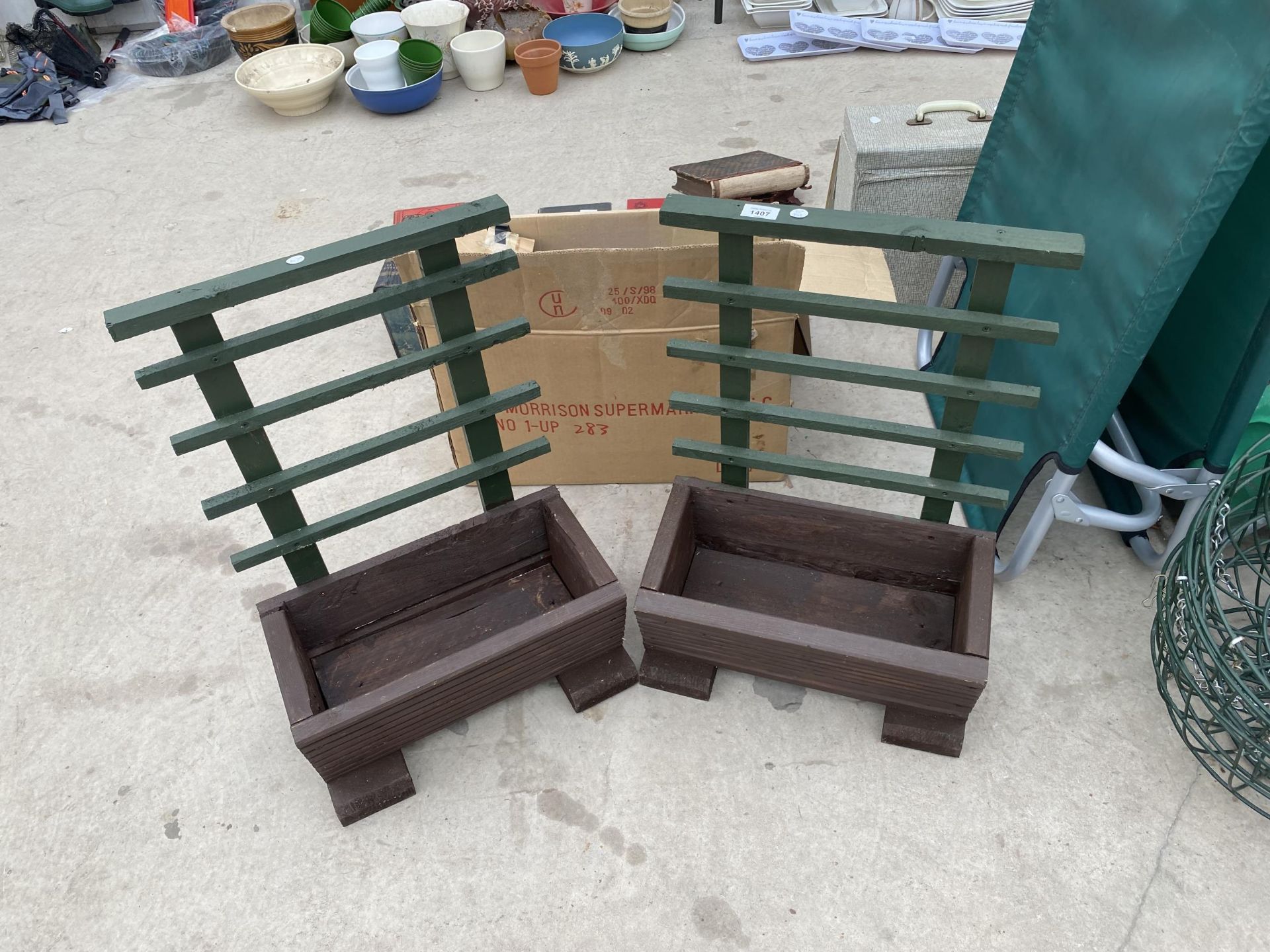 A PAIR OF PAINTED WOODEN PLANTER TROUGHS