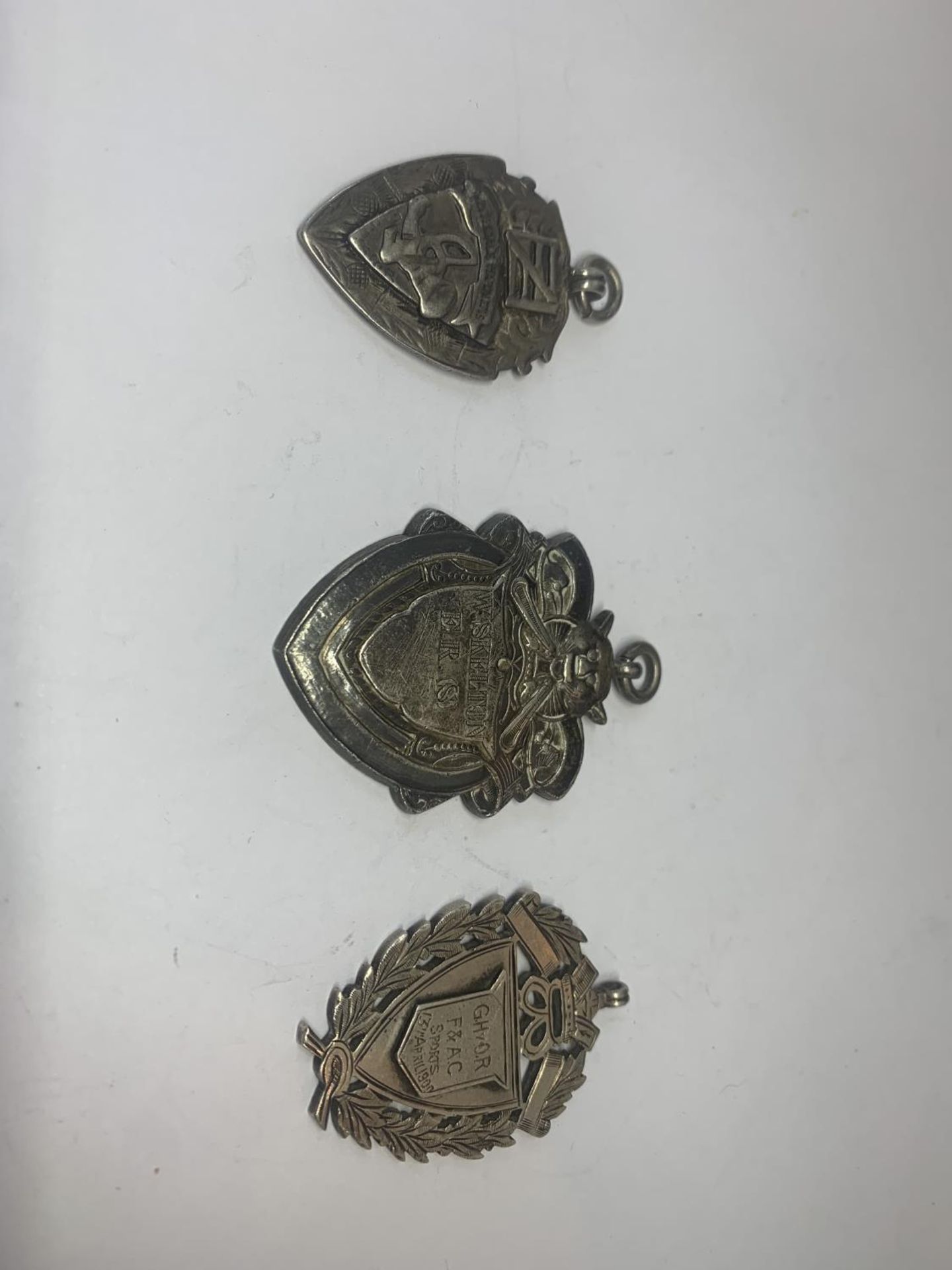 THREE SILVER WATCH FOBS