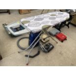 AN ASSORTMENT OF ITEMS TO INCLUDE A MIELE VACUUM CLEANER, A EWBANK AND AN IRONING BOARD ETC