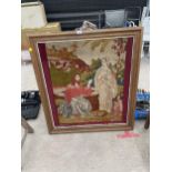 A GILT FRAMED TAPESTRY