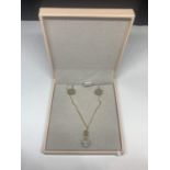 A 9 CARAT GOLD EARRING AND NECKLACE SET IN A PRESENTATION BOX