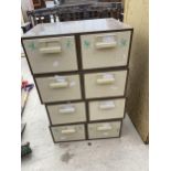 A GROUP OF FOUR TWO DRAWER STACKING STORAGE UNITS
