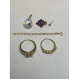 TWO 14 CARAT GOLD RINGS WITH CLEAR STONES, A SMALL LENGTH OF CHAIN, TWO PENDANTS WITH GOLD TOPS