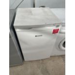 A WHITE HOOVER UNDERCOUNTER FREEZER