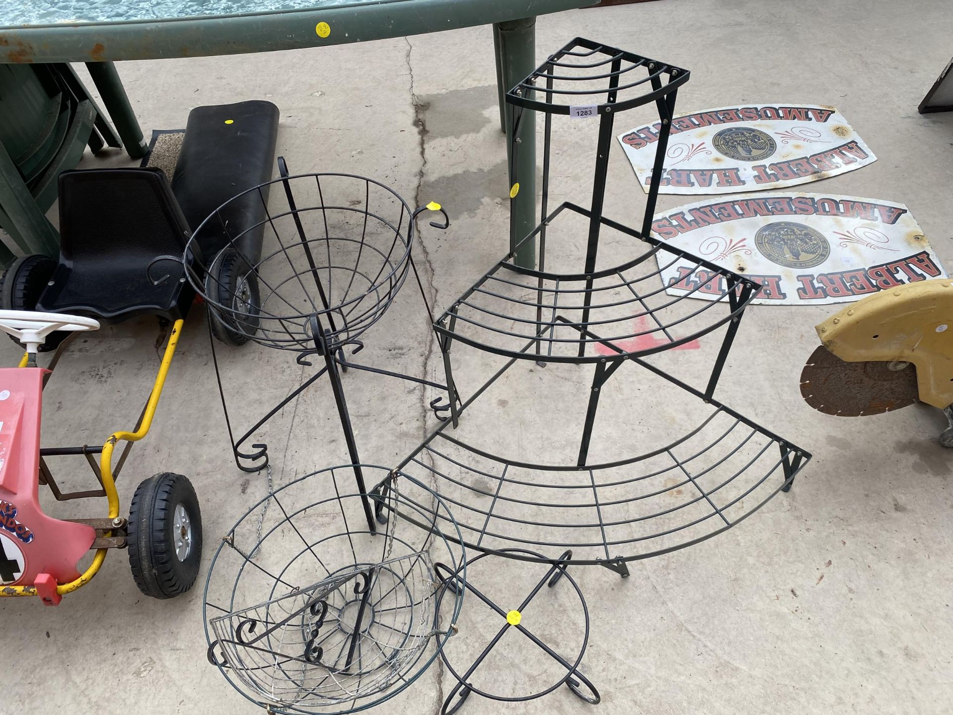 AN ASSORTMENT OF GARDEN ITEMS TO INCLUDE A WROUGHT IRON PLANT STAND, THREE TIERD PLANT STAND AND