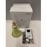 A BOXED ROYAL DOULTON GEMSTONES FIGURINE WITH A GENUINE SWAROVSKI CRYSTAL - AUGUST - PERIDOT