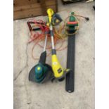 AN ELECTRIC HEDGE TRIMMER AND A FURTHER TWO ELECTRIC GRASS STRIMMERS