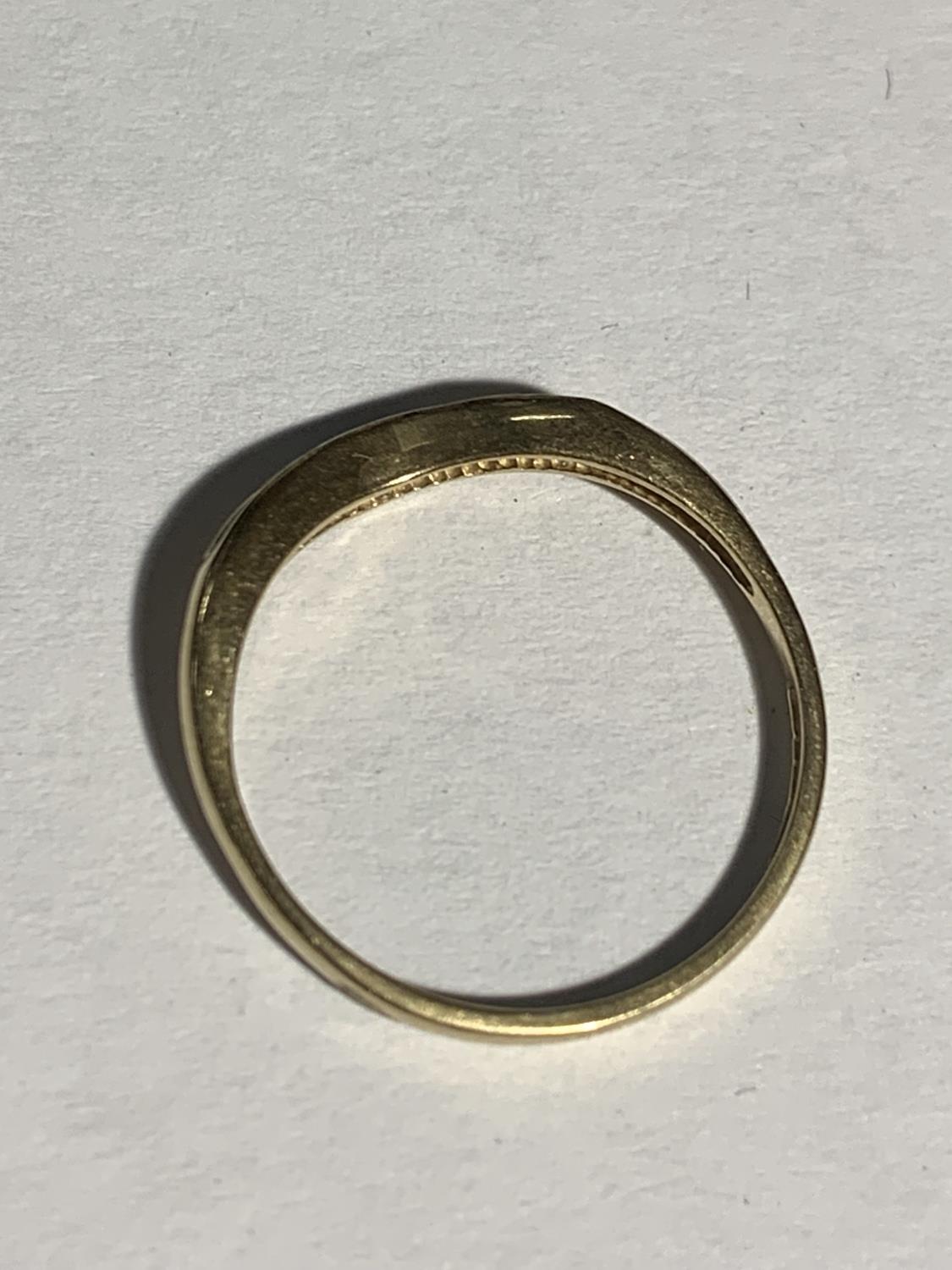 A 9 CARAT GOLD RING IN A WISHBONE DESIGN WITH CLEAR STONES POSSIBLY DIAMONDS SIZE N/O GROSS WEIGHT - Image 3 of 3