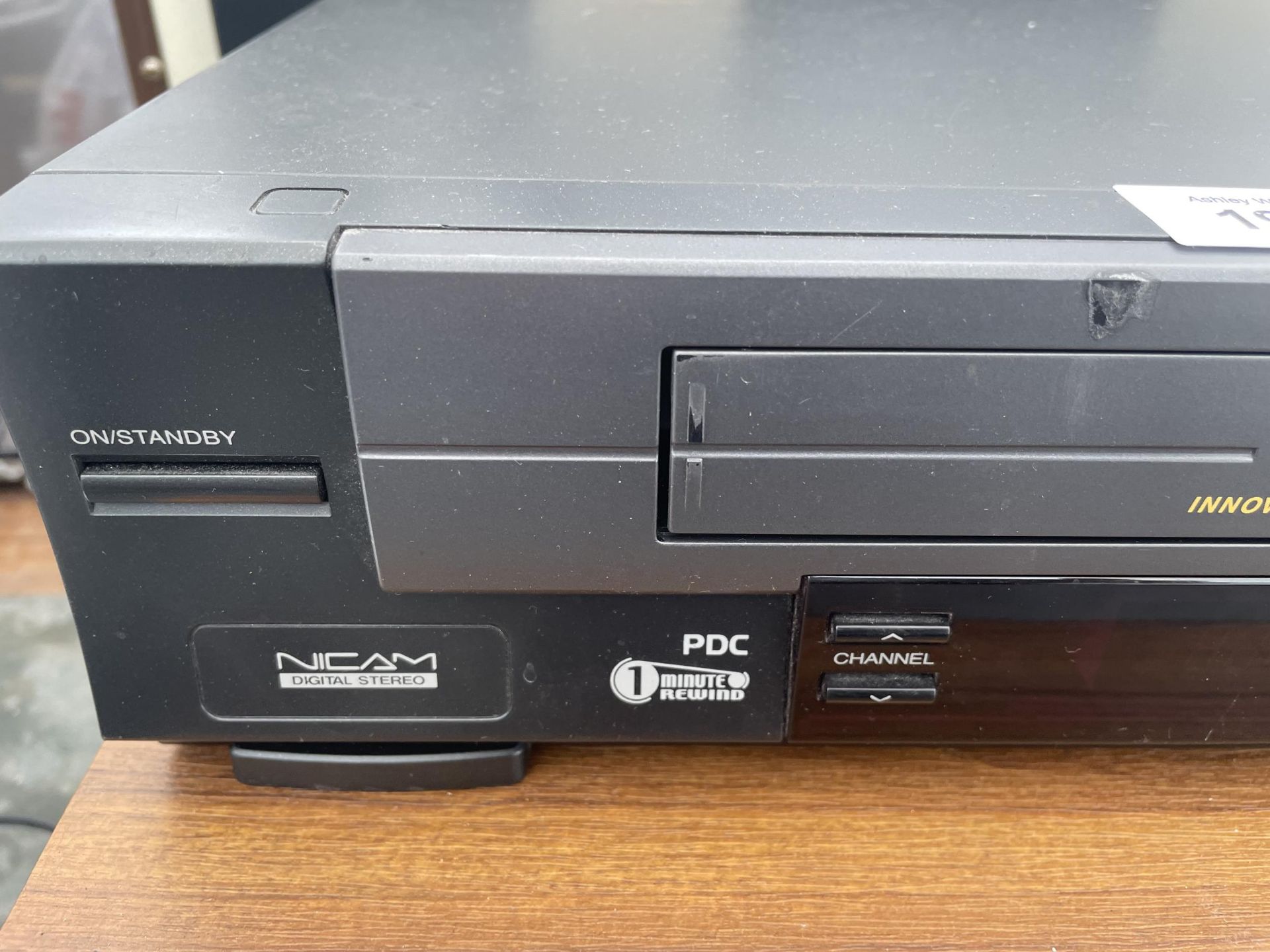 A TOSHIBA VHS PLAYER AND AN ASSORTMENT OF CASSETTES - Image 2 of 2