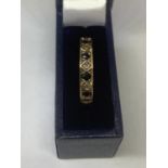 A 9 CARAT GOLD RING WITH NINE IN LINE SAPPHIRES AND DIAMONDS SIZE L IN A PRESENTATION BOX