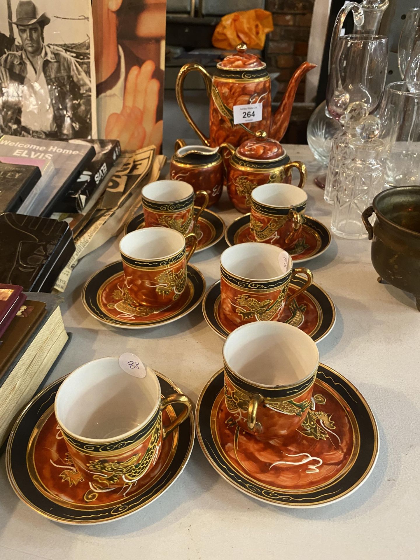 A FIFTEEN PIECE ORIENTAL TEA SET WITH DRAGON DECORATION