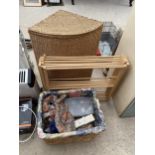 A WICKER LAUNDRY BASKET, A CLOTHES AIRER AND A FURTHER WICKER BASKET CONTAINING SEWING ITEMS ETC