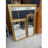 A MODERN GILT FRAMED WALL MIRROR, 54 X 42" AND TWO SMALLER MIRRORS