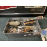 A TIN BOX OF CUTLERY TO INCLUDE SPOONS, FORKS ETC